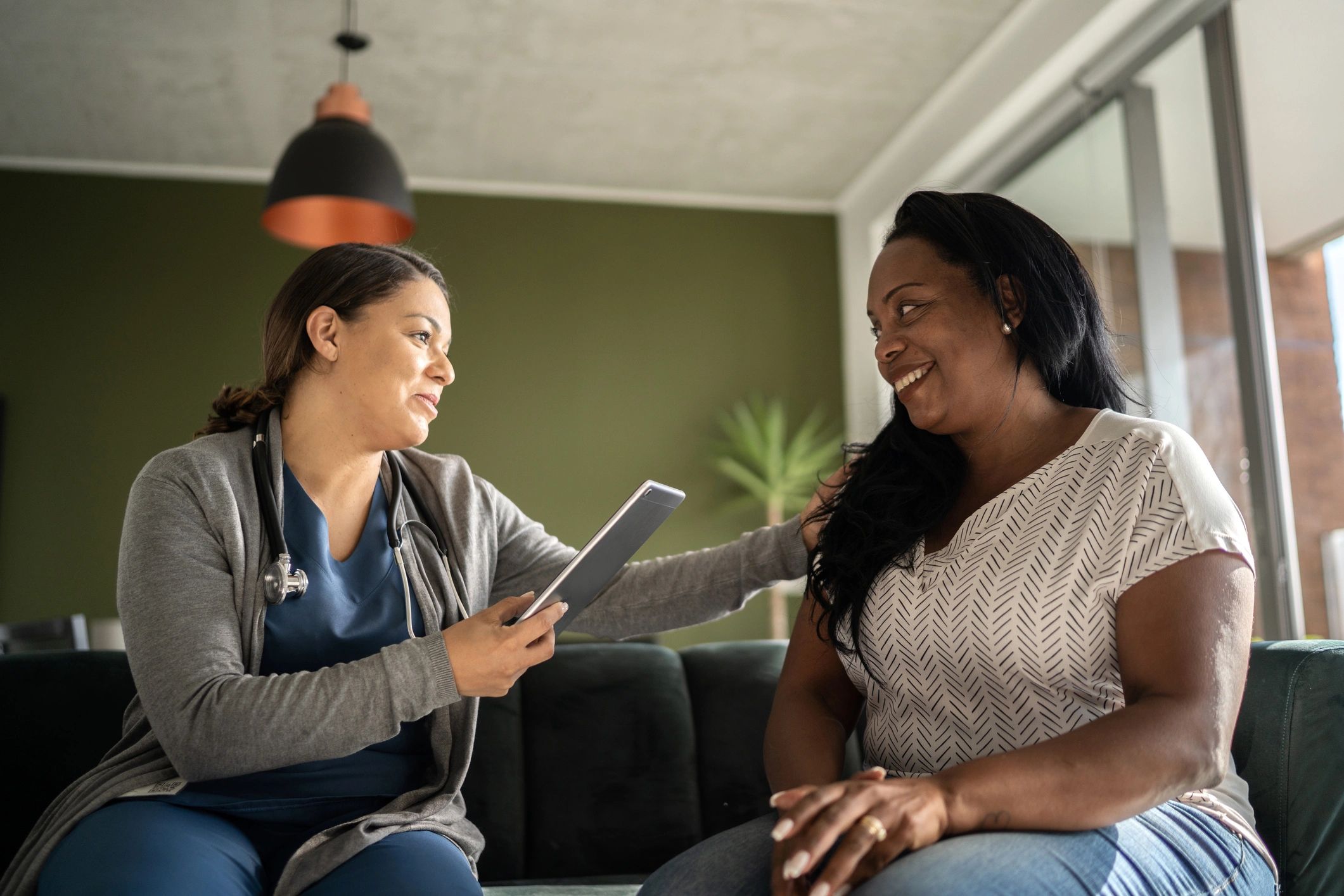Compassionate counselor speaking with a client