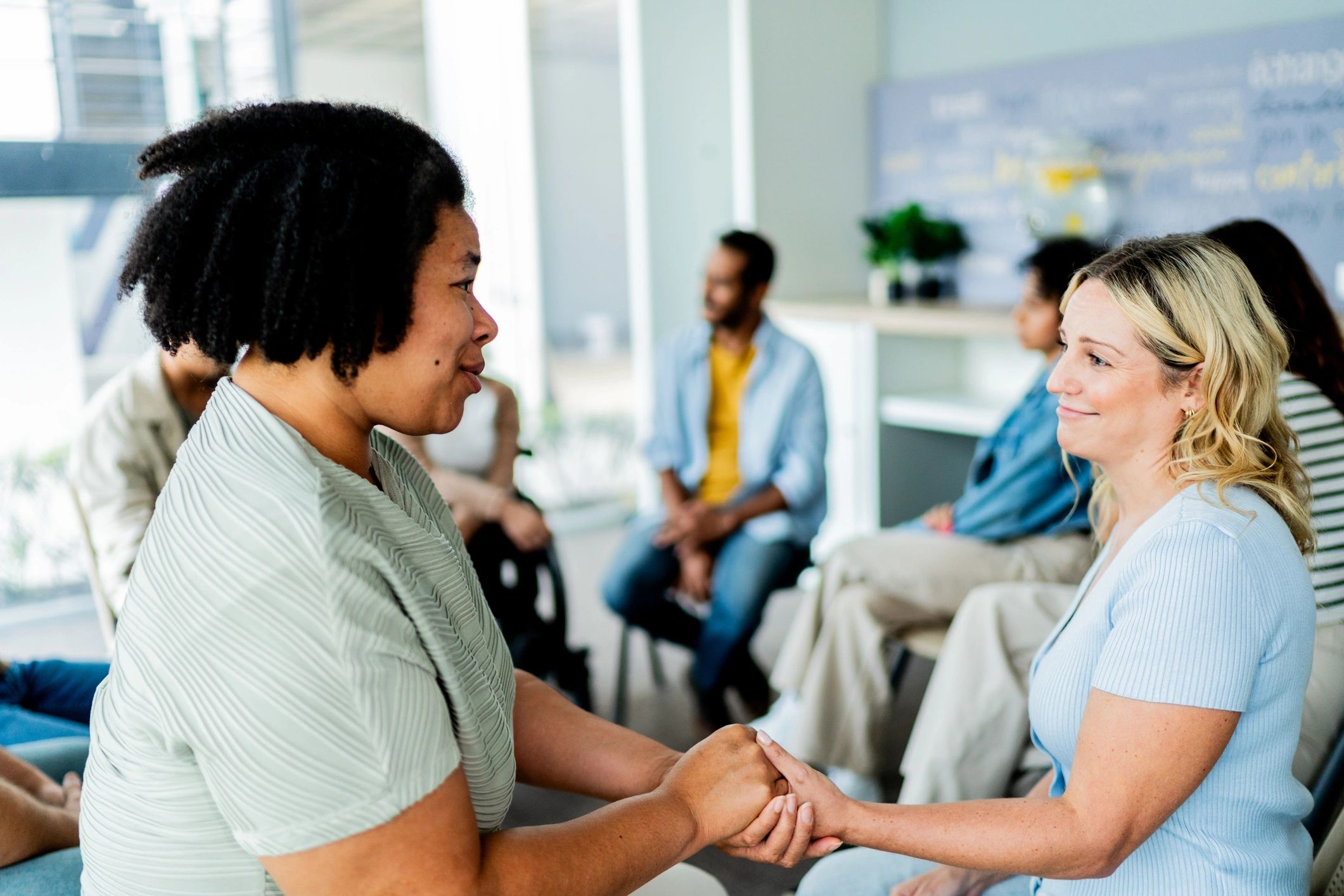 Counselor supporting a client during a therapy session